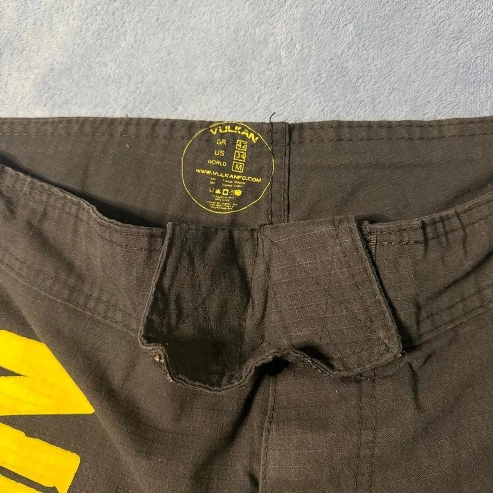 Vulkan black & yellow board shorts men  Size M /34